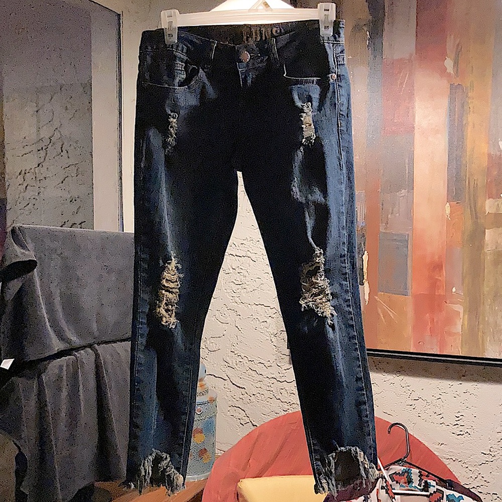 VIP jeans size 3/4 short waisted and distressed..